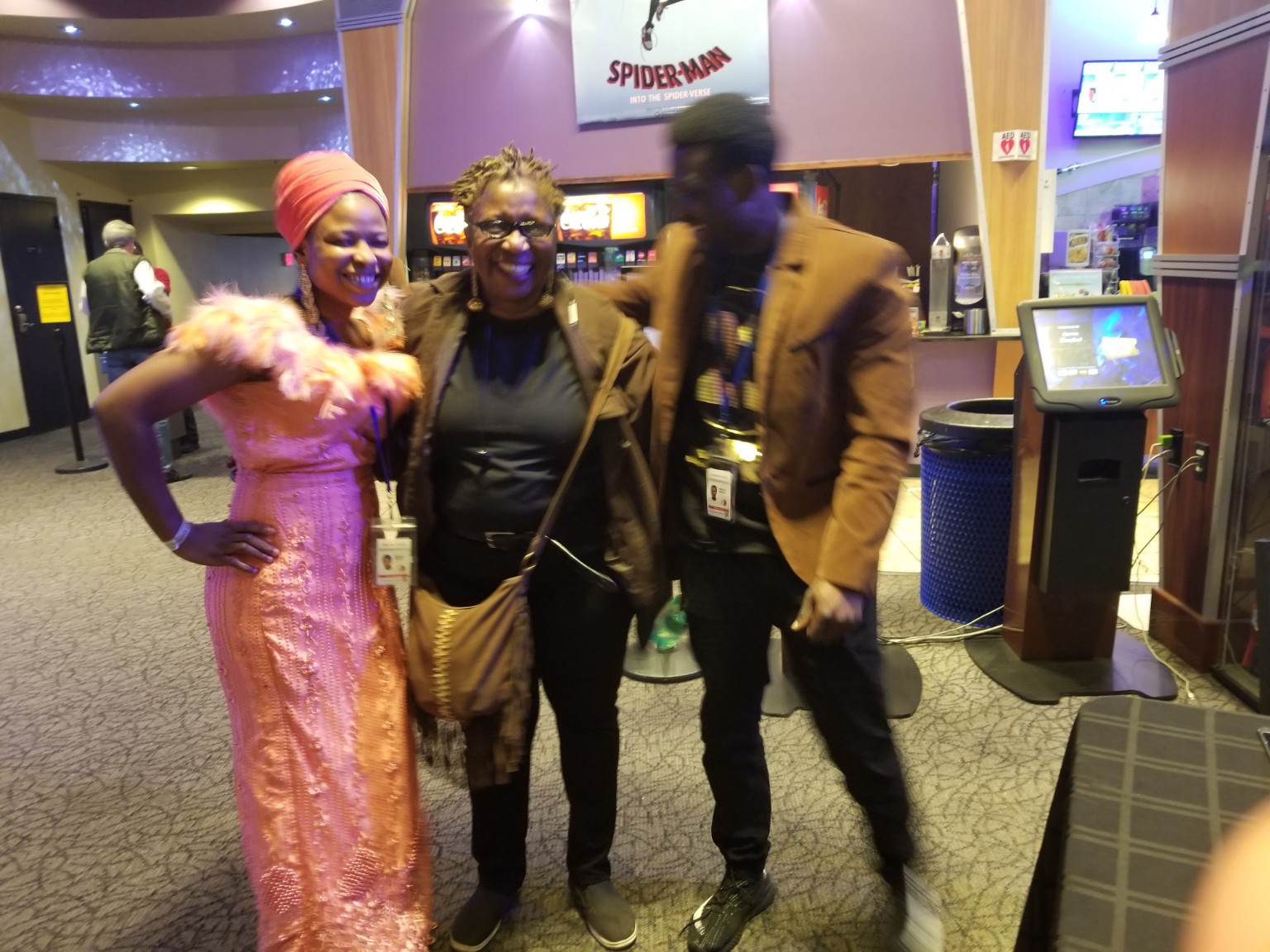 Guests sharing a candid moment at the movie premiere