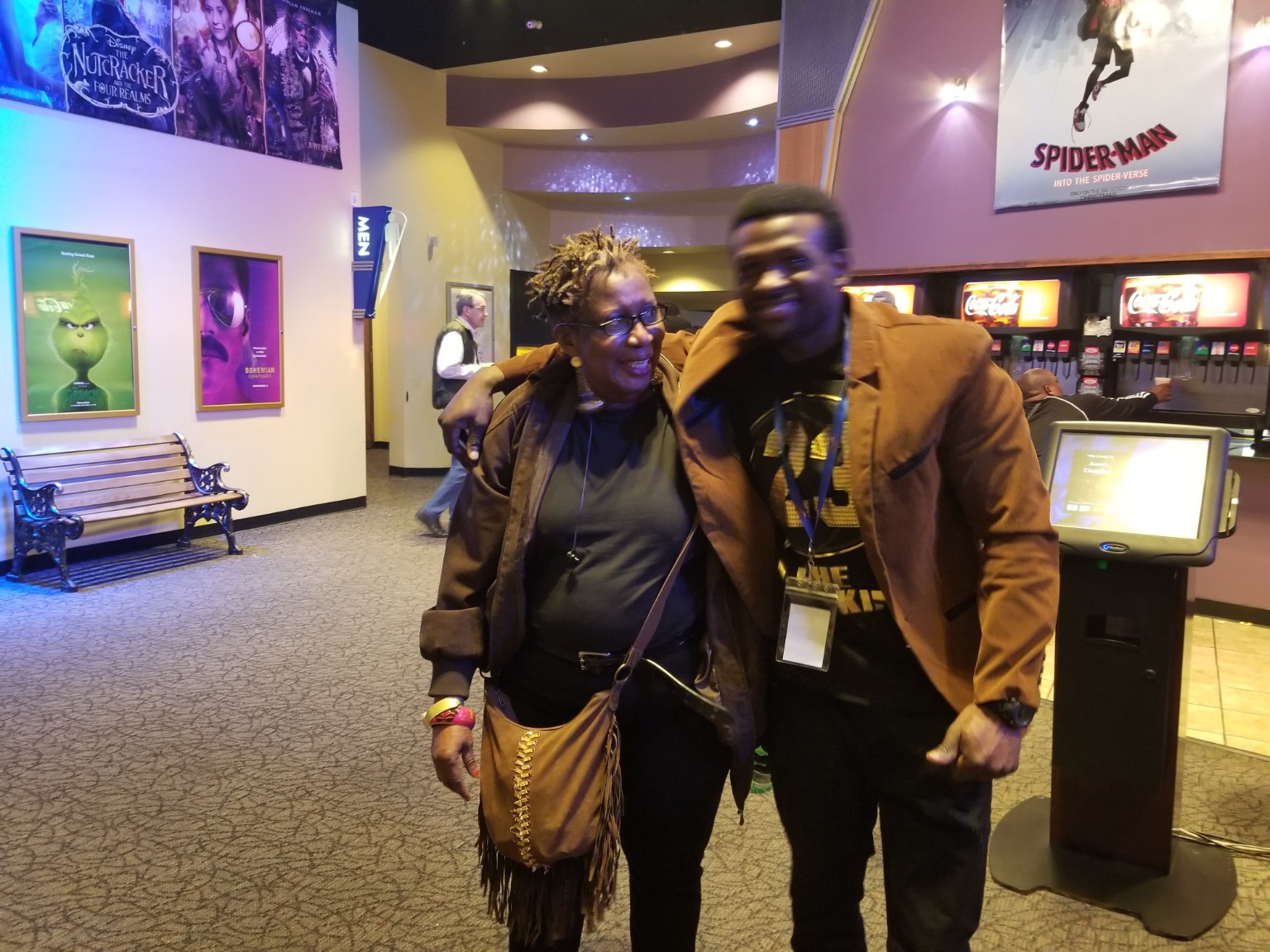Premiere guests gathering inside the movie theater