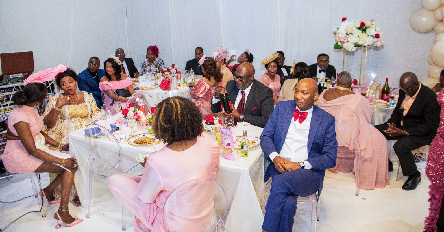 Guests enjoying the elegant reception setting at a San Antonio surprise birthday celebration